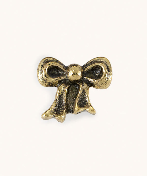 Brass Bow Candle Pin